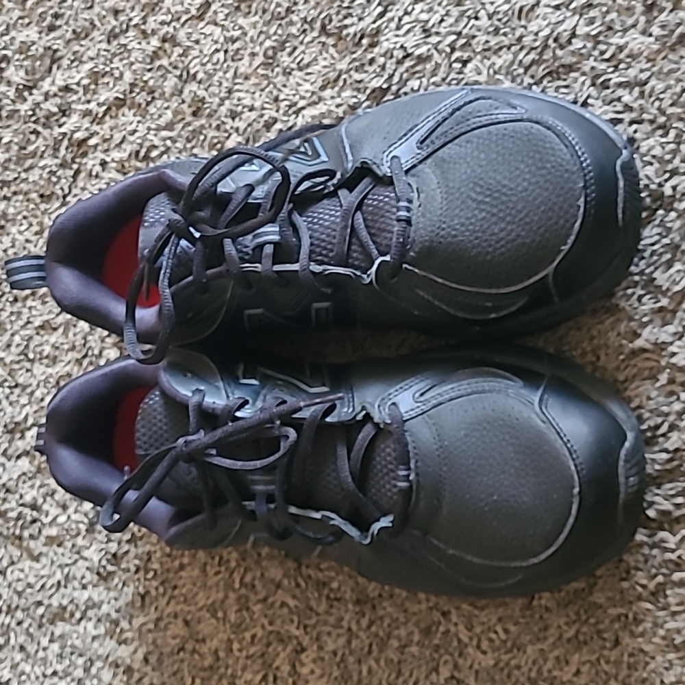 Mens New Balance running shoes, New. Never worn. Size 12 (2E wide)